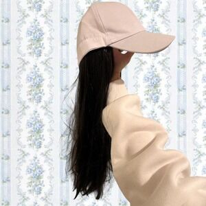 White Baseball Cap with Black Synthetic Hair Attached.